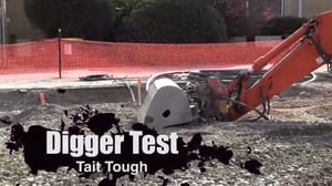 Digger Covers Radio In Gravel